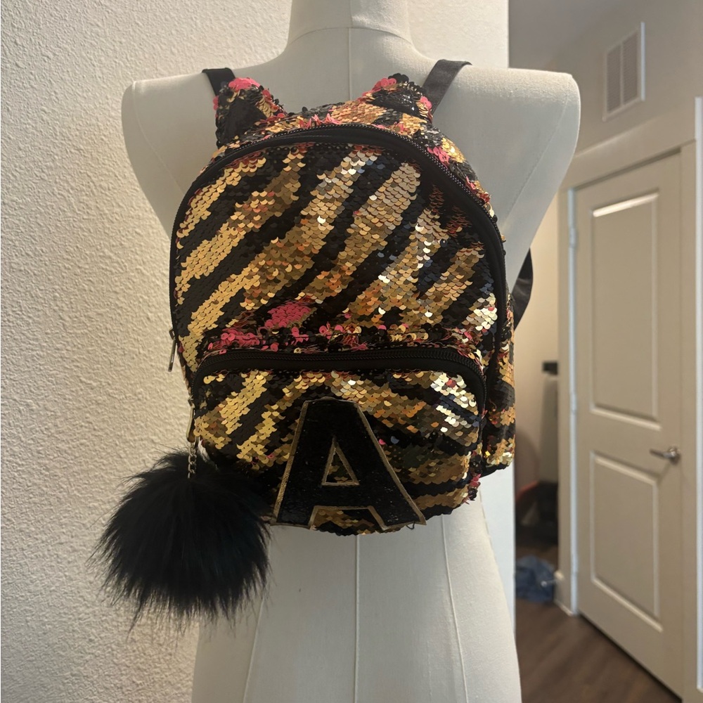 New with tags. Justice Flip Sequin Mini Backpack